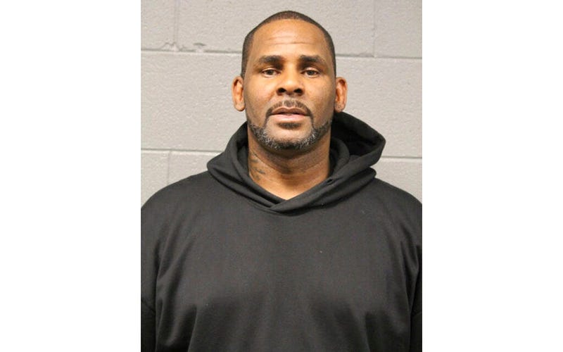 In this photo taken and released by the Chicago Police Dept., Friday, Feb. 22, 2019, R&B singer R. Kelly is photographed during booking at a police station in Chicago, Ill.
