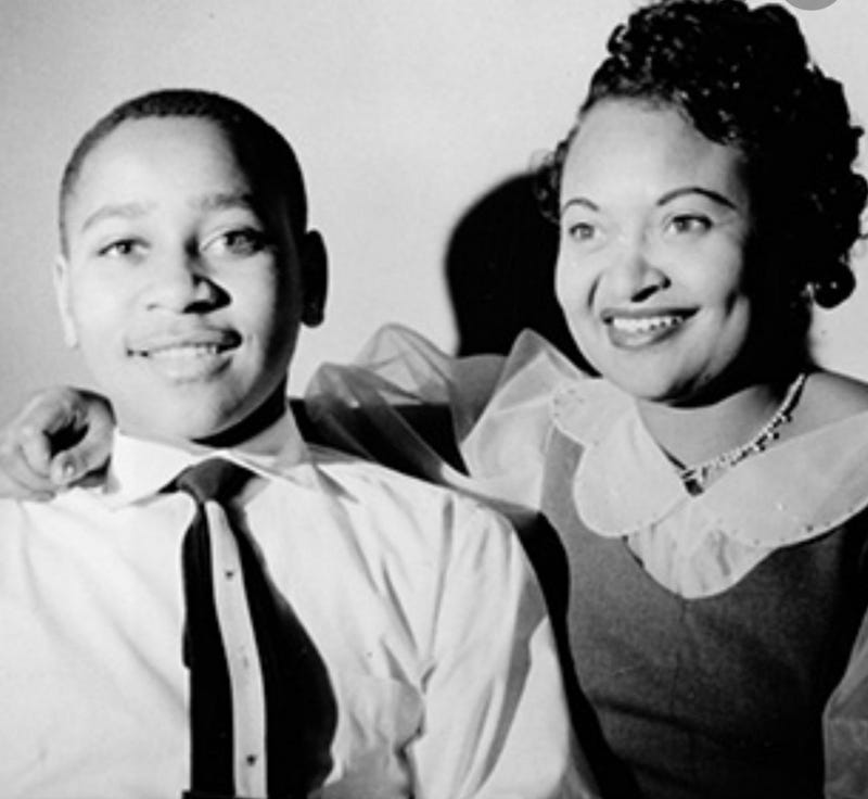 Emmett Till is shown with mother Mamie Till before his ill-fated trip to Mississippi where he was lynched by two white men.