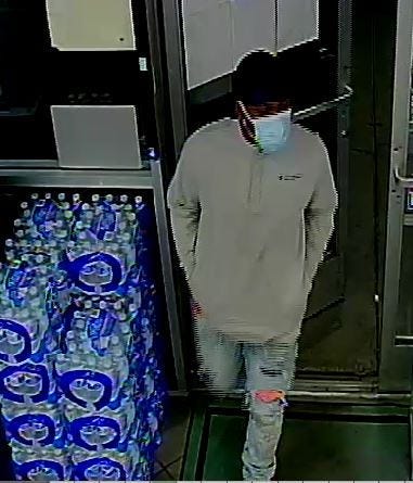 Surveillance snapshot of a robbery suspect from 1-20-21