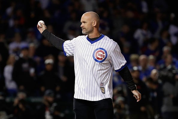 David Ross throws out the first pitch at a Cubs playoff game.