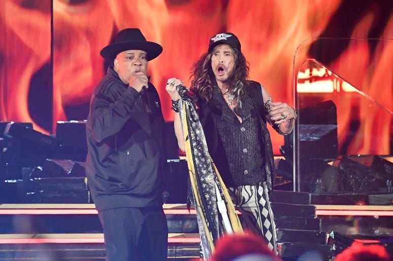 oseph \"Run\" Simmons of RUN-DMC perform with Steven Tyler of Aerosmith during the 62nd annual GRAMMY Awards