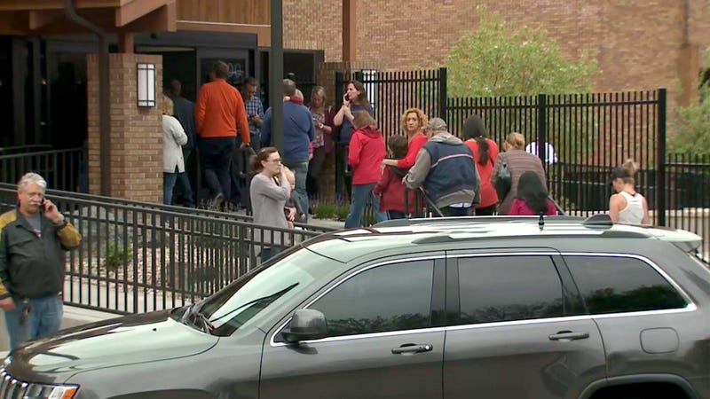 Parents were directed to a recreation center to pick up their children, following a shooting at the STEM School Highlands Ranch in Colorado.
