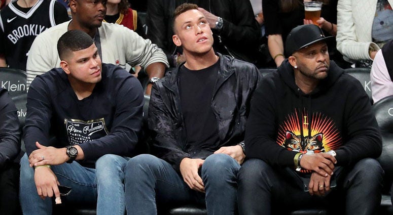 CC Sabathia, Aaron Judge and Dellin Betances attend a Nets-Cavaliers game at Barclays Center on Oct. 25, 2017.