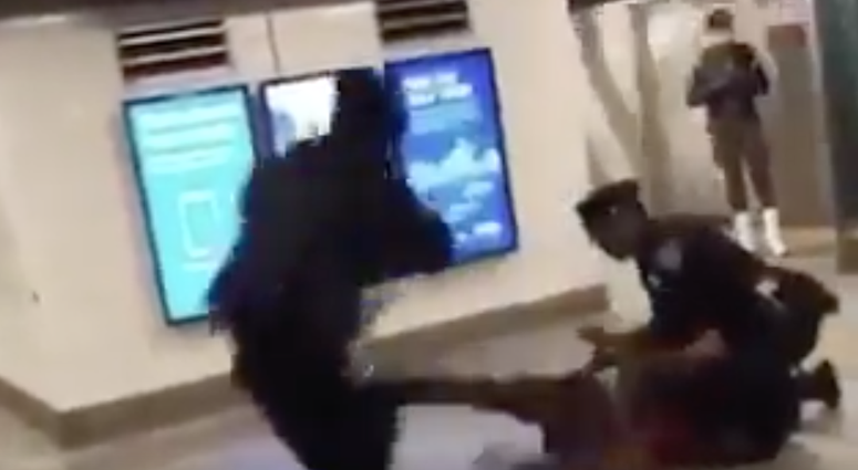 Video shows an officer being kicked onto subway tracks