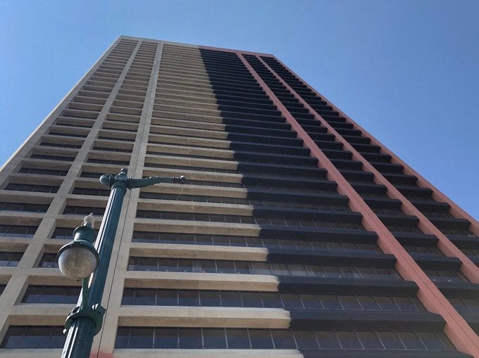 Seneca One Tower with its old and new colors. July 8, 2020 (WBEN Photo/Mike Baggerman)