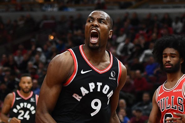 Raptors forward Serge Ibaka roars after a play.