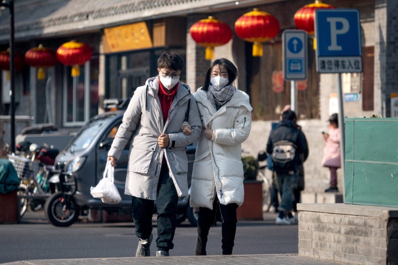 Citizens wear face masks; a number of pneumonia-like coronavrius cases has reportedly exceeded 400 due to its mutation and airborne nature.