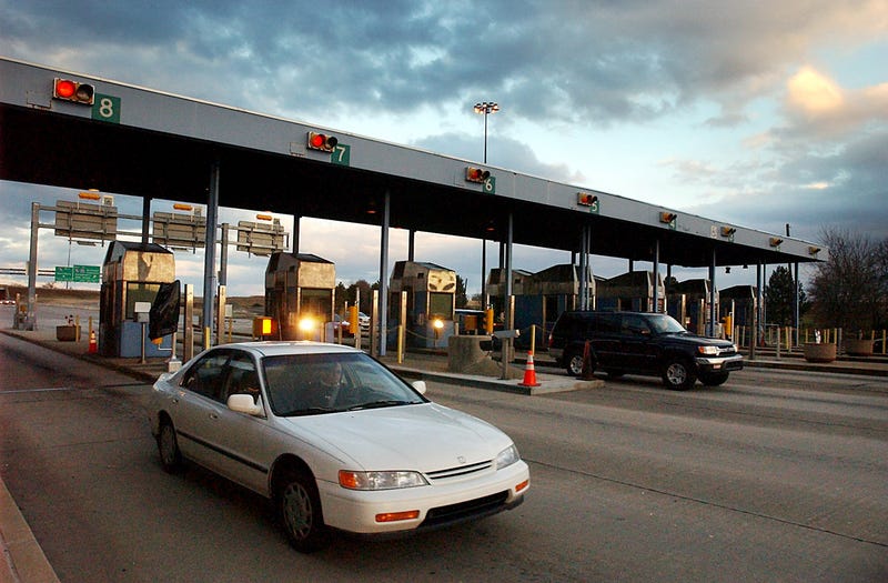 Motorists pass through Downingtown Interchange of the Pennsylvania Turnpike in Uwchlan Township in Pennsylvania, January 13, 2004. Estimates of its value vary from $2 billion to $30 billion.