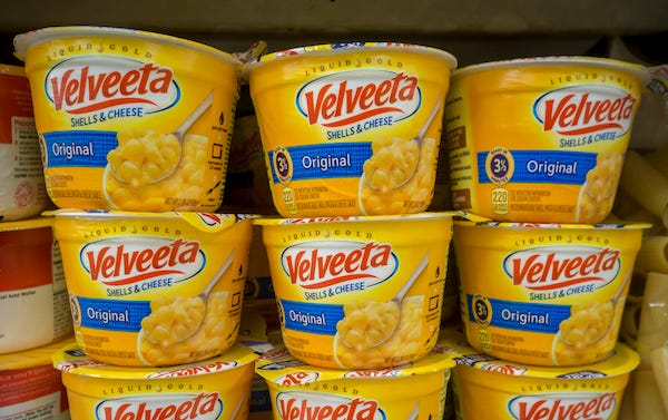 Containers of Velveeta Shells and Cheese are seen in a supermarket