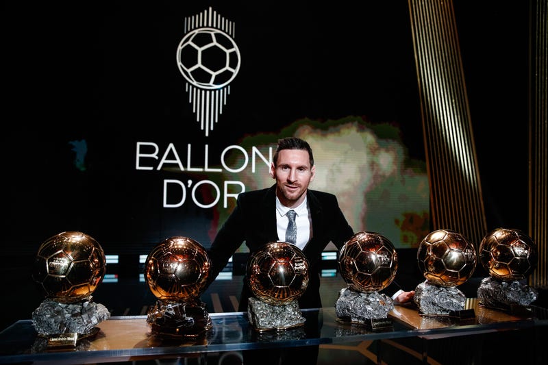 Barcelona's Argentinian forward Lionel Messi poses with the trophies during the Ballon d'Or 2019 awards ceremony at the Theatre du Chatelet in Paris, France, Dec. 2, 2019.