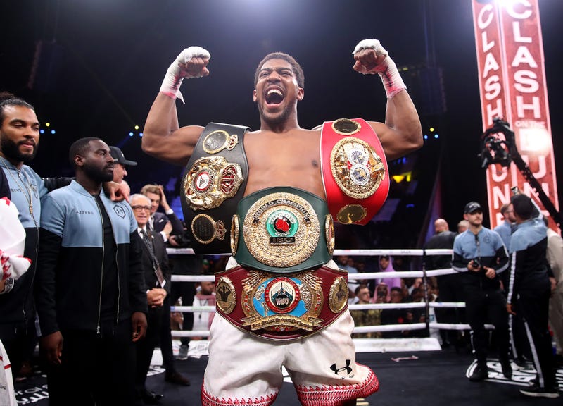 Anthony Joshua with WBO, WBA, IBF, IBO Titles