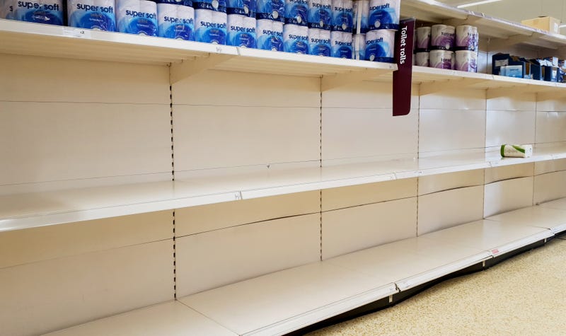 A view of empty shelves as toilet roll is almost sold out in a supermarket in Ashford, Kent. UK shoppers are stockpiling toilet paper, pasta, hand sanitiser and tinned foods as fears grow over the spread of the coronavirus.