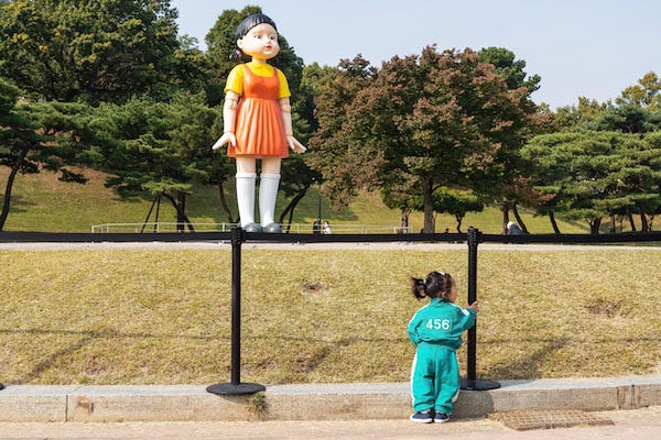 Giant doll from Squid Game at theme park