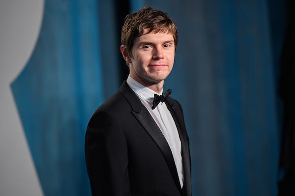 Evan Peters walking on the red carpet at the 2022 Vanity Fair Oscar Party