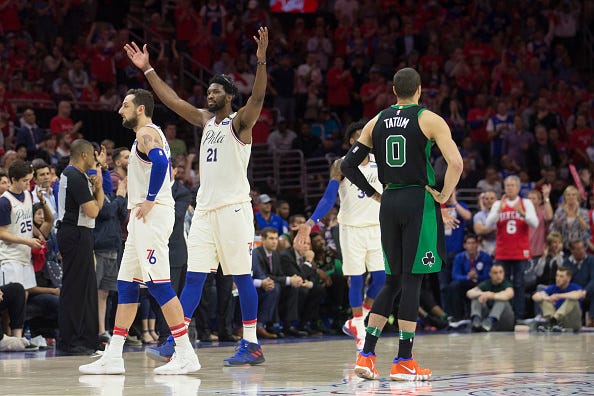 Sixers' Joel Embiid celebrates a victory over the Celtics.