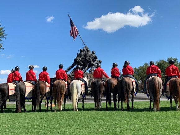 BraveHearts riders stop in front of the U.S. Marine Corps War Memorial during the Trail to Zero ride in Virginia.