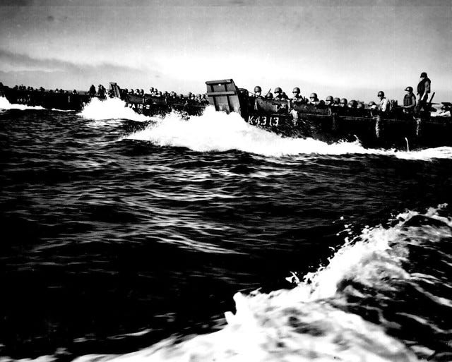 A first wave of U.S. troops approaches the beaches of northwest Luzon, Philippines, Jan. 9, 1945.