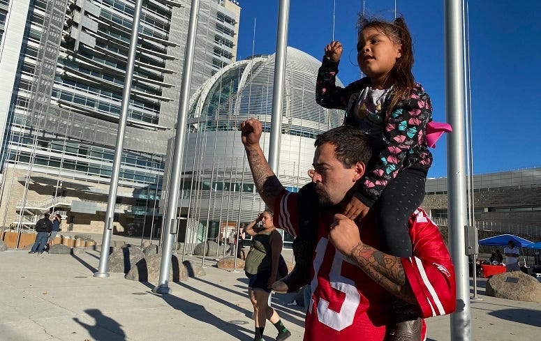 Protestors demonstrate outside San Jose City Hall after no charges were filed in the death of Breonna Taylor