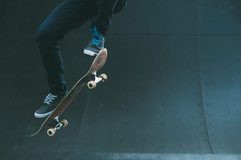 Man on skateboard jumping