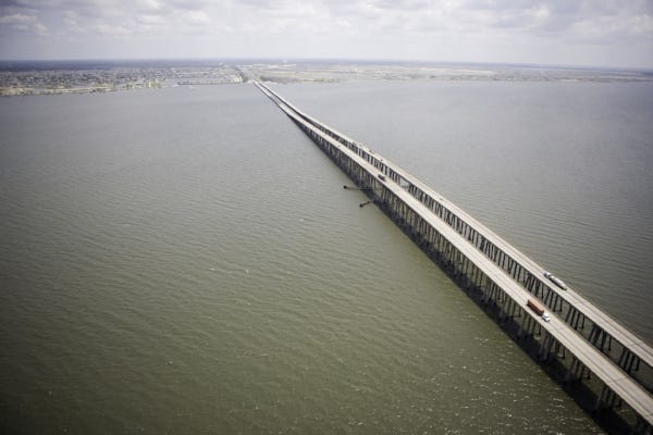 Man falls to death from Twin Spans after accident on roadway