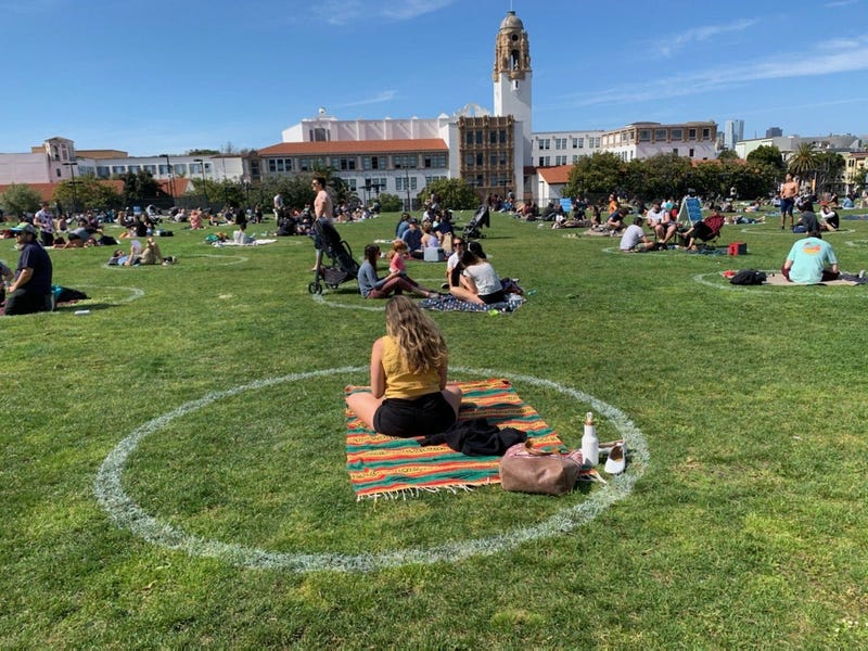 Groups socially distance at San Francisco's Mission Dolores Park