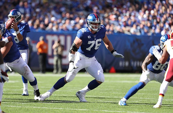 Nate Solder looks to make a block for the Giants in a game vs. Redskins.