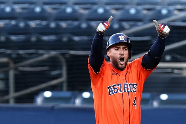 George Springer celebrates a hit for the Mets.