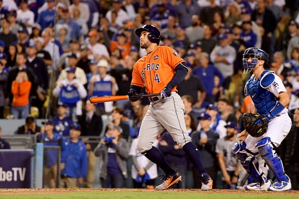George Springer hits a home run for the Astros against the Dodgers