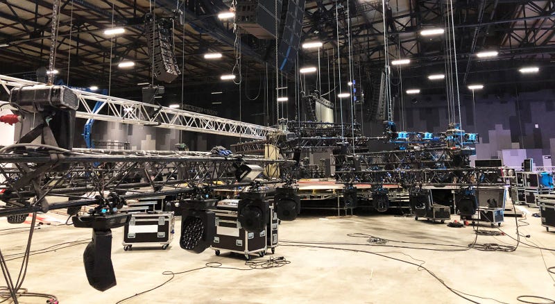 nstallation of professional sound, light, video and stage equipment for a concert. Lifting of line array speakers.