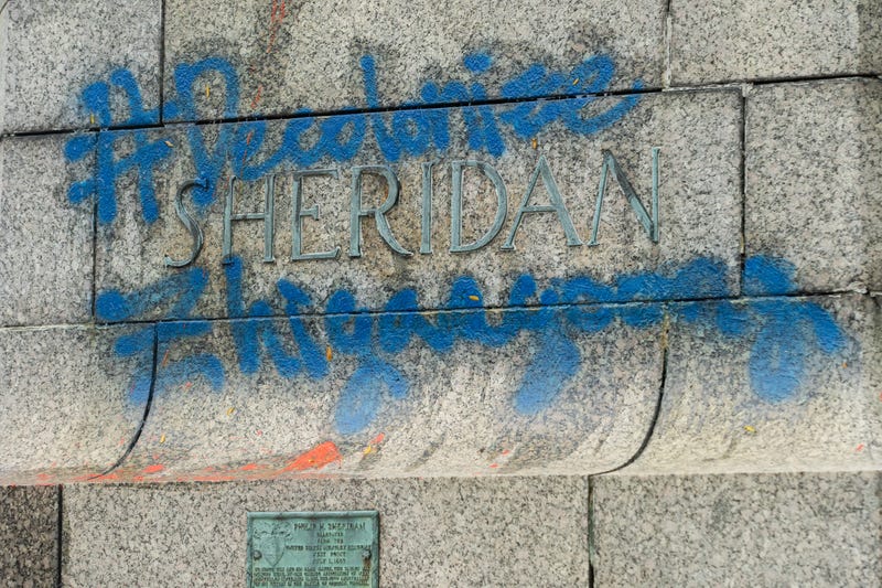defaced statue