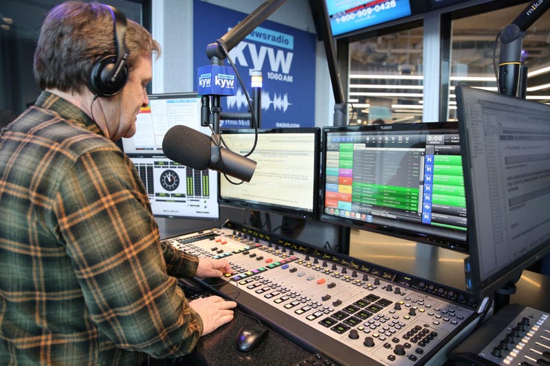 Anchor Brandon Brooks on the air in one of the new air studios.