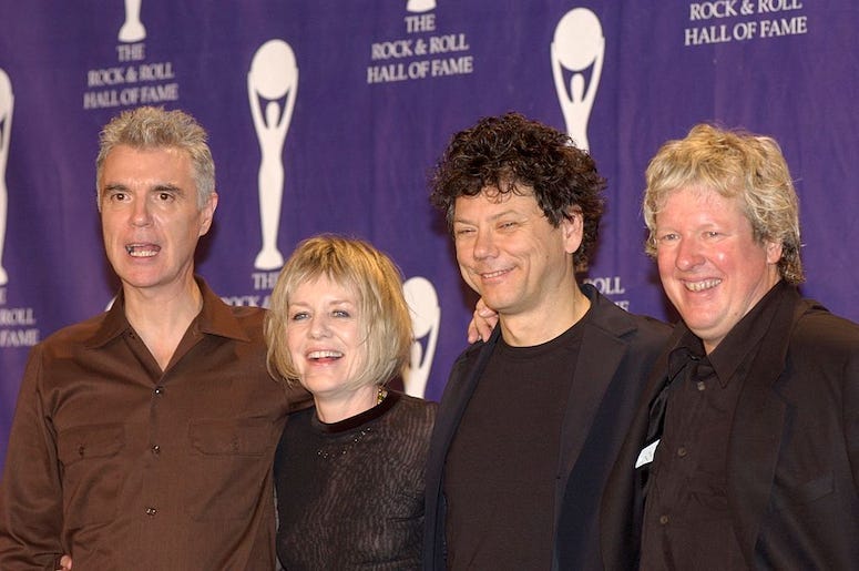 Members of the Talking Heads attend an awards ceremony.