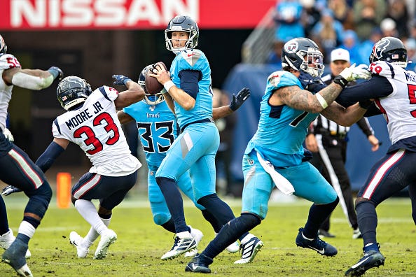 Ryan Tannehill drops back for a pass against the Texans.