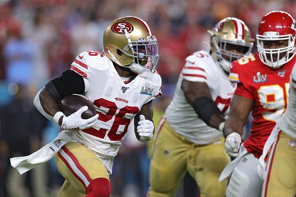 Tevin Coleman follows his blockers against the Chiefs in Super Bowl LIV.