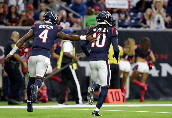 Deshaun Watson and DeAndre Hopkins celebrate a big play.