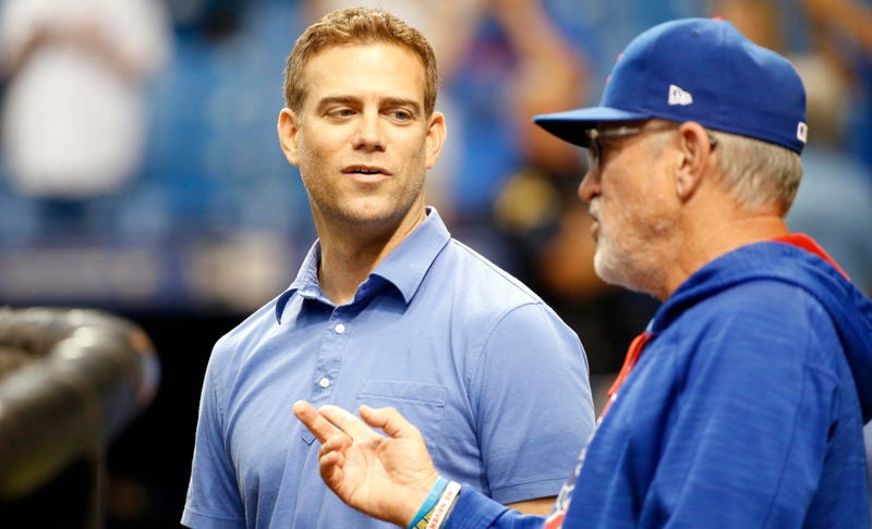 Cubs president of baseball operations Theo Epstein, left, and manager Joe Maddon