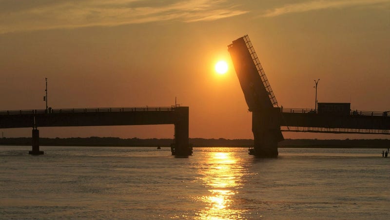 Townsend’s Inlet Bridge between Avalon and Sea Isle City, New Jersey at sunset with the drawbridge up for boats to pass below.