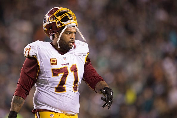 Trent Williams heads to the Redskins sideline during a game in 2018.