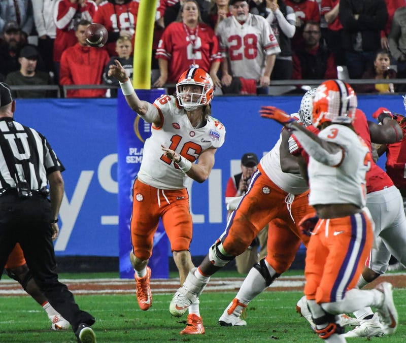 Clemson quarterback Trevor Lawrence (16) throws a pass against Ohio State during the fourth quarter of the PlayStation Fiesta Bowl of the College Football Playoffs semi-final game, at State Farm Stadium in Glendale, Arizona Saturday, December 28, 2019. Cl