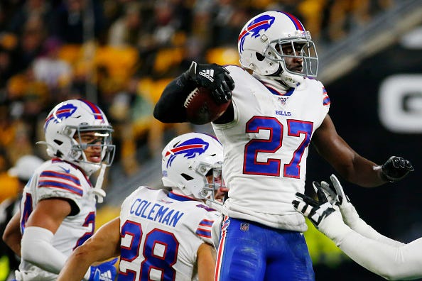 Tre'Davious White celebrates an interception with his Bills teammates.