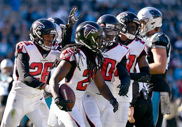 Desmond Trufant celebrates an interceptions with the Falcons.