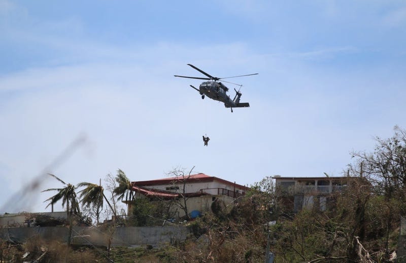 In response to Hurricane Irma, members of the U.S. Navy perform rescue missions