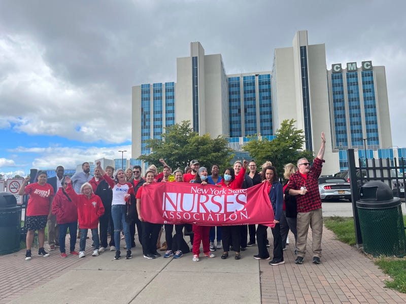 Healthcare workers outside ECMC