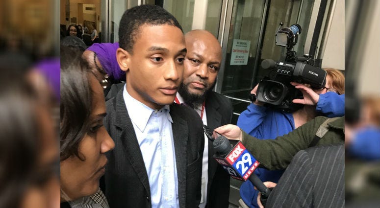 Michael White walking out of court.