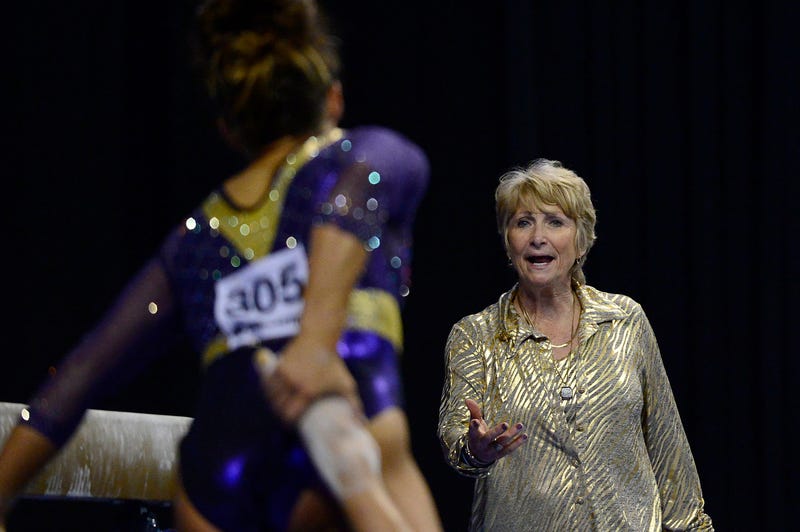 LSU Tigers gymnastics head coach D-D Breaux talks with Ashleigh Gnat prior to a beam performance during the semi-finals of the 2017 NCAA Women's Gymnastics Championships at Chaifetz Arena.