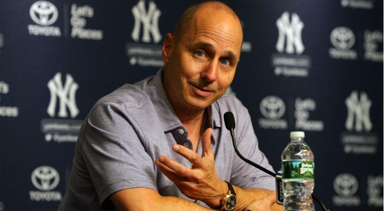 Brian Cashman speaks with the media before a game against the Detroit Tigers at Yankee Stadium. The Yankees today traded for Oakland Athletics pitcher Sonny Gray at the MLB trade deadline.