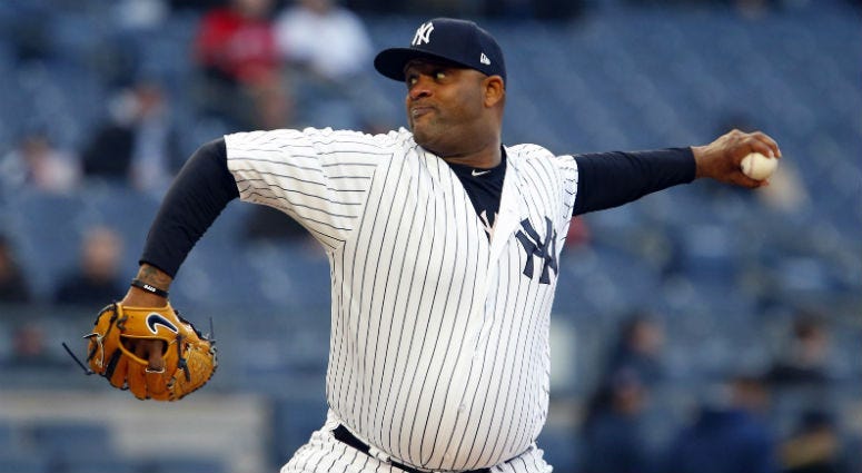 New York Yankees starting pitcher CC Sabathia delivers a pitch against Toronto Blue Jays in the first inning at Yankee Stadium.