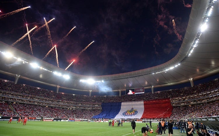 Fireworks go off before the game between the Chivas Guadalajara and the Toronto FC at Akron Stadium.