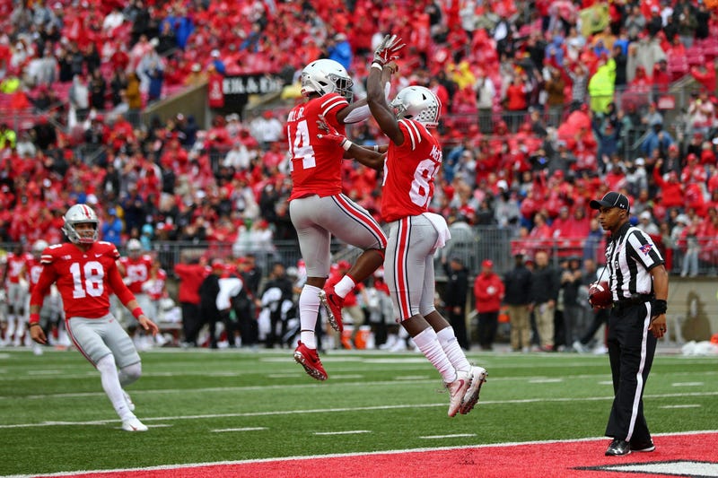 Ohio State Buckeyes wide receiver Terry McLaurin (83) celebrates scoring a touchdown with wide receiver K.J. Hill (14) against the Rutgers Scarlet Knights in the first half at Ohio Stadium.