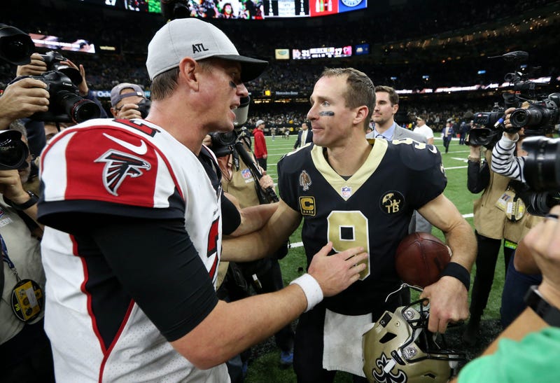 Nov 22, 2018; New Orleans, LA, USA; Atlanta Falcons quarterback Matt Ryan (2) and New Orleans Saints quarterback Drew Brees (9) talk after their game at the Mercedes-Benz Superdome. Mandatory Credit: Chuck Cook-USA TODAY Sports
